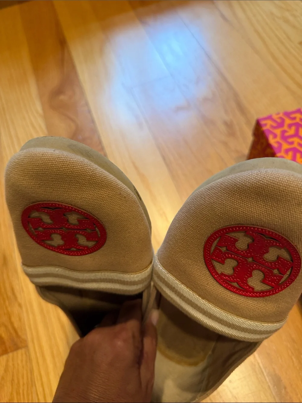 Tory Burch Tan Canvas Slip-Ons with Red Logo Medallions
